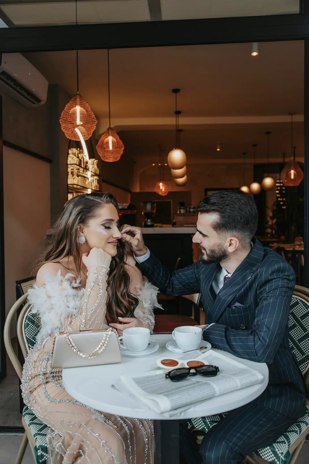 A couple meeting at a public outdoor café
